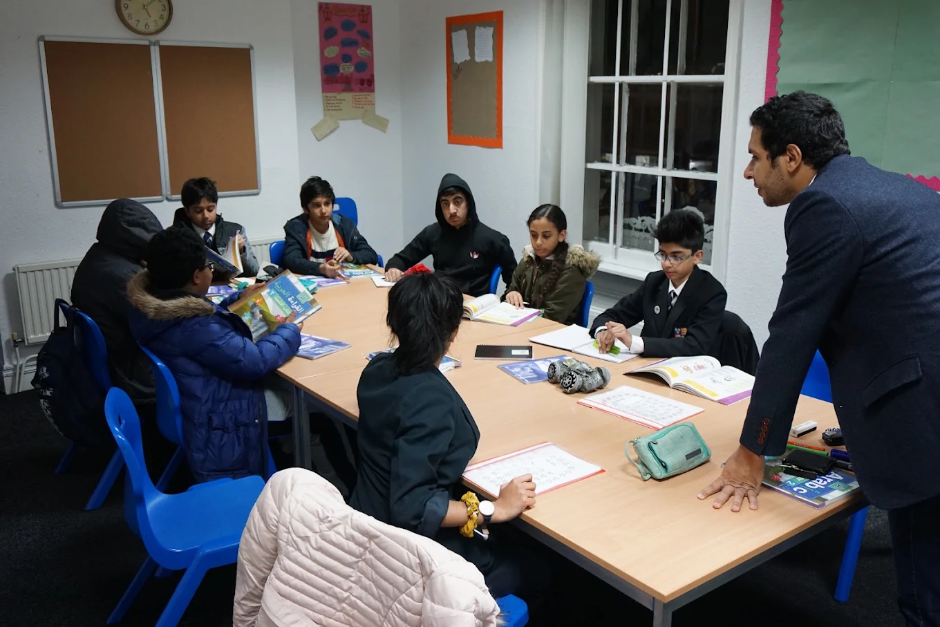 A tutor leading a focused classroom session at Edgbaston Tuition Centre